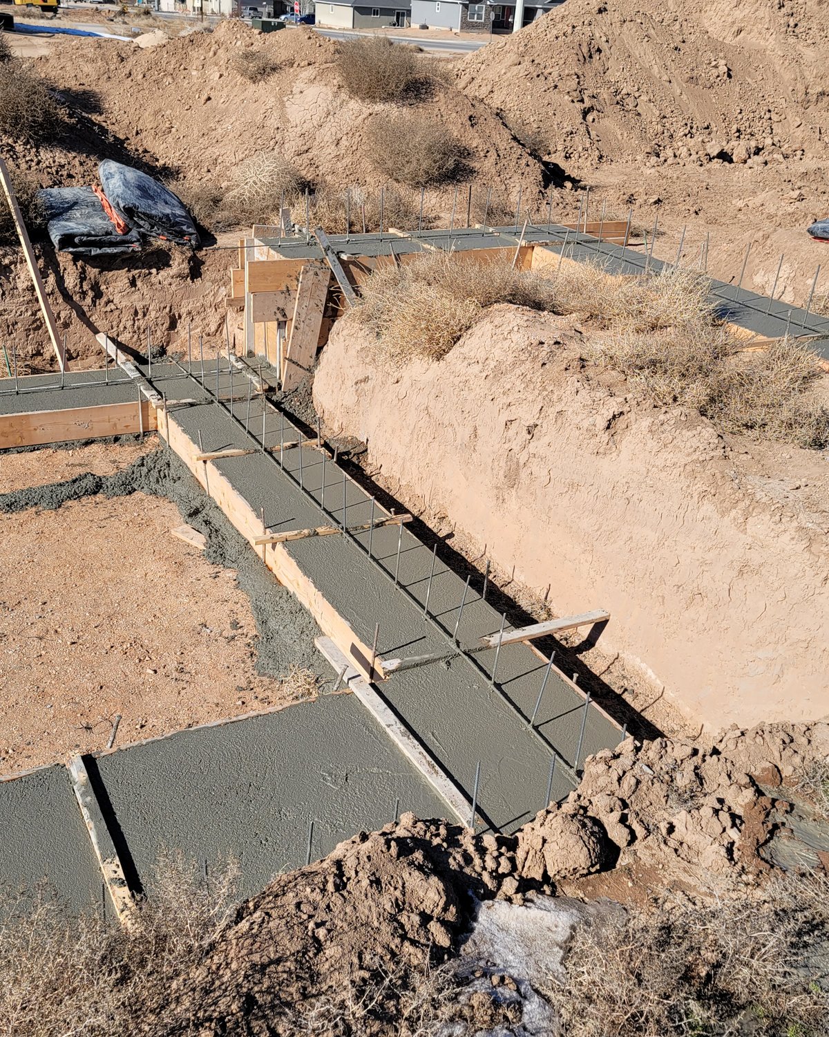 Excavated footing trenches