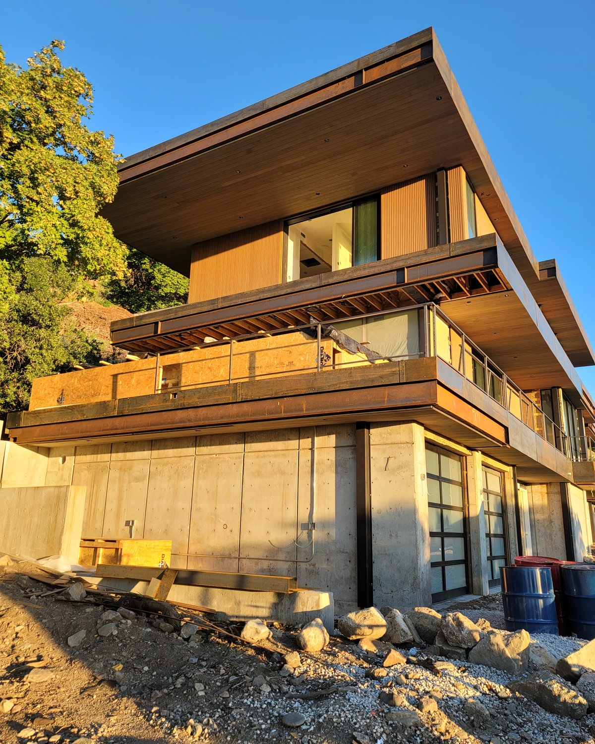 Modern home exterior with finished site work