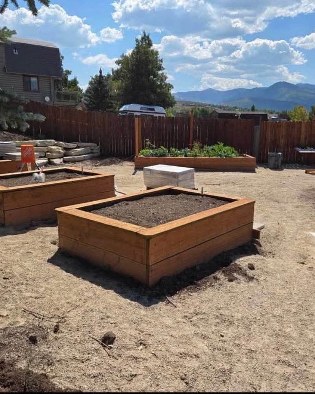 Cedar planter beds in a backyard