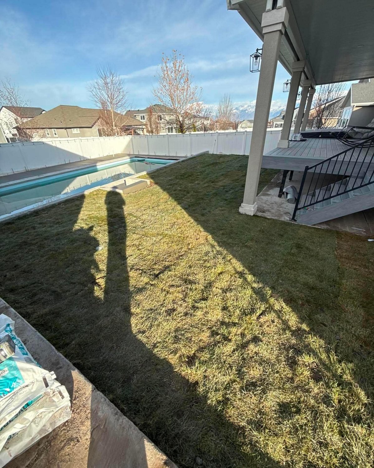Pool-side sod yard with mountain view