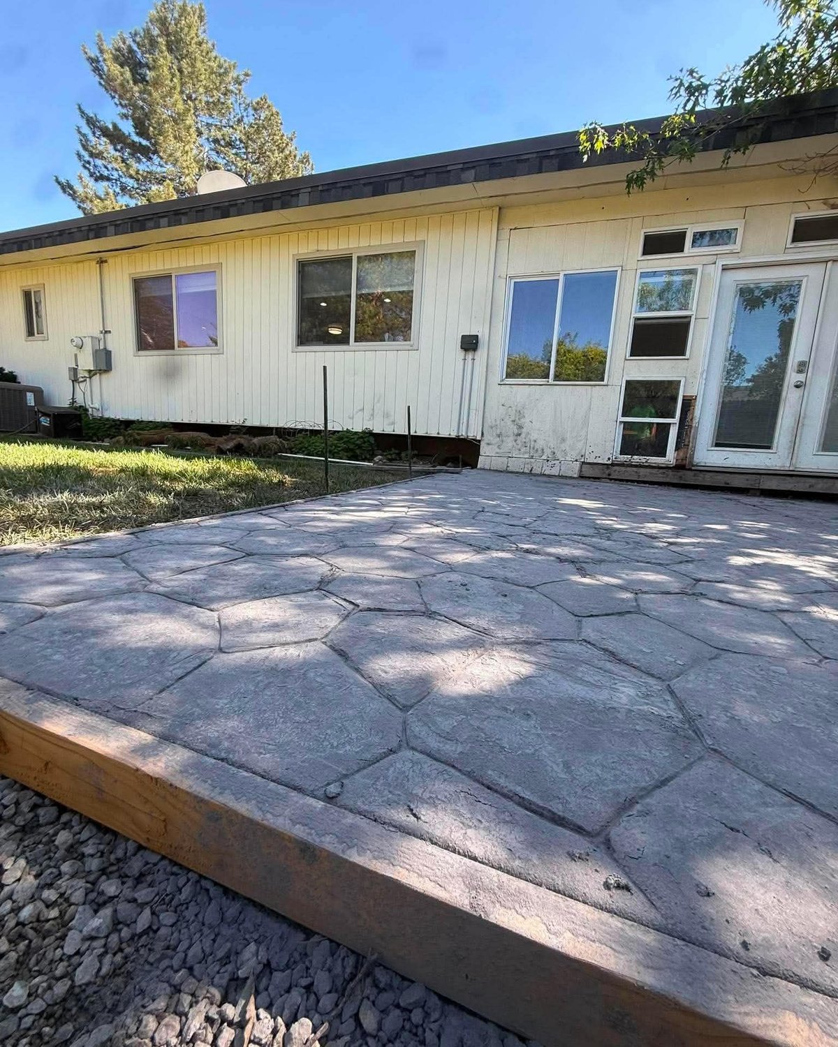 Flagstone patio with concrete border