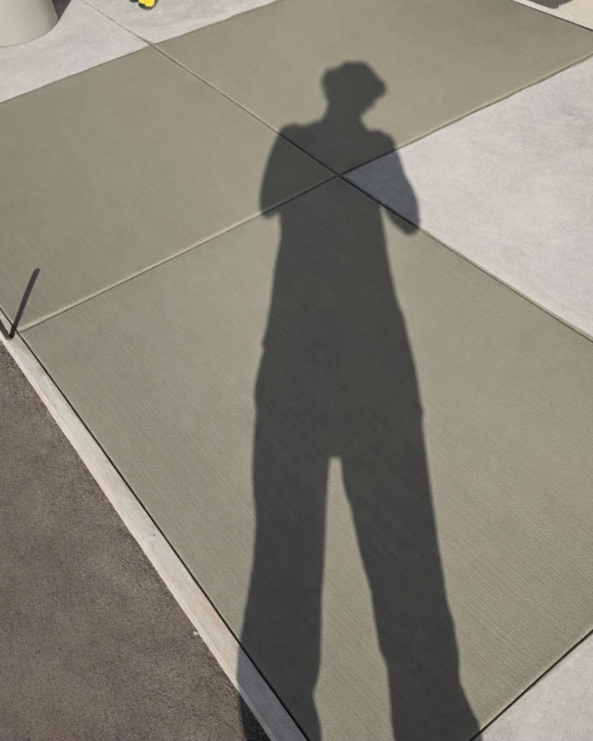 Wide concrete walkway finish